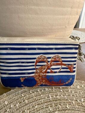 Coach Blue and White Striped Wristlet with Coral Sequin lobster